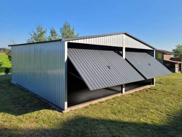 Plechová garáž 6×5 m – sedlová strecha, 2× výklopné brány 1